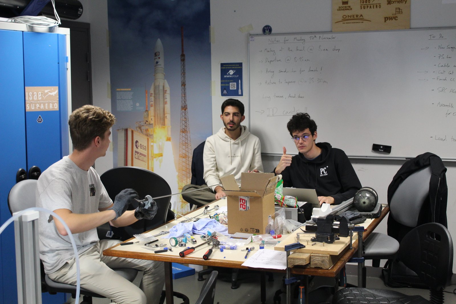 Team members working in the workshop